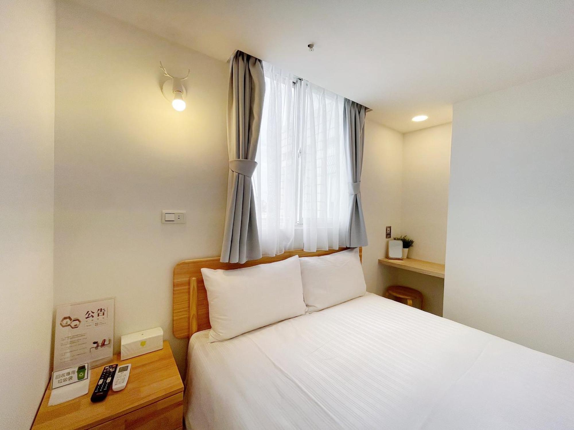 See U Apartment Tainan Bagian luar foto