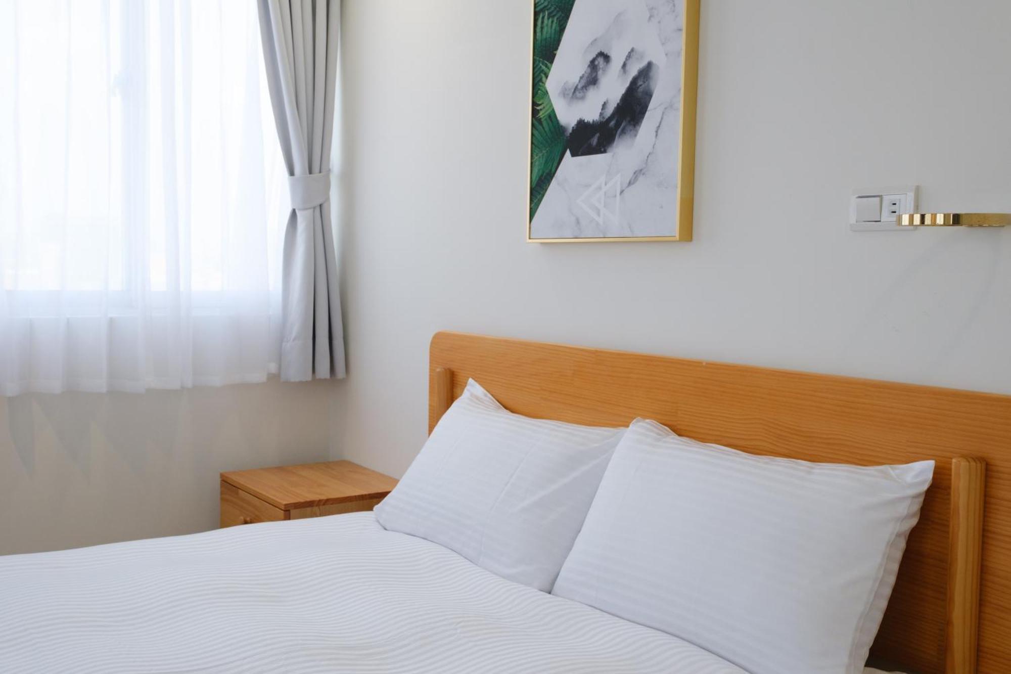 See U Apartment Tainan Bagian luar foto