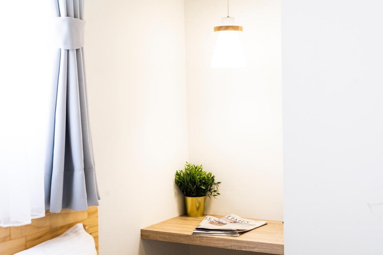 See U Apartment Tainan Bagian luar foto